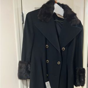 Women black midi coat with furs on the colllar and sleeves double breasted